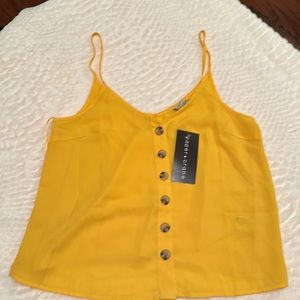 Yellow top size small.
